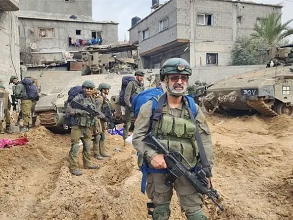 52-year-old Rabbi Avraham Zarbiv among soldiers in Gaza