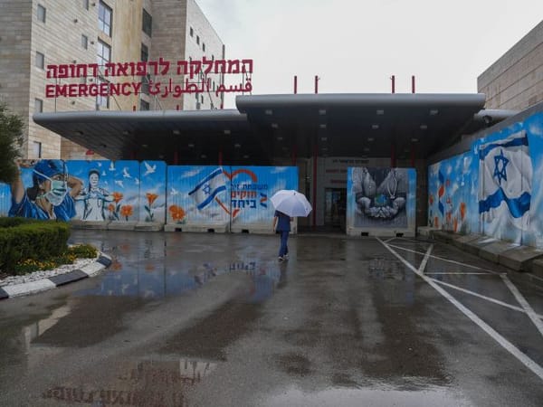 Woman killed, seven injured in rocket attack in Safed in north