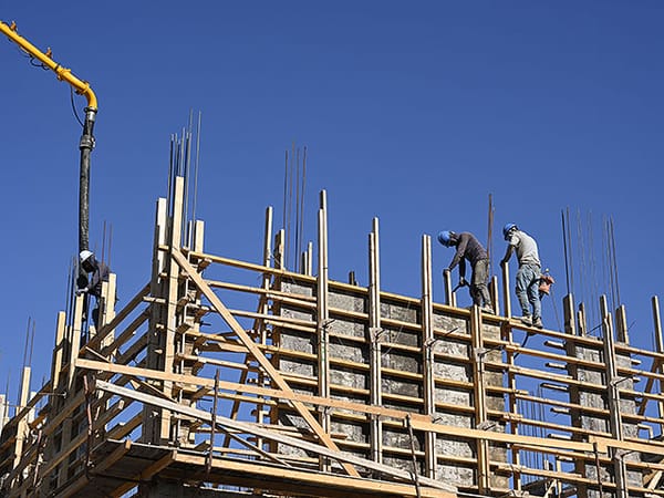 Lawsuit filed with High Court against 'private' import of foreign construction workers