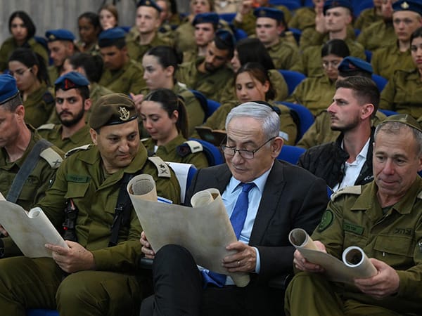 Netanyahu joins Erez Battalion soldiers in scroll of Esther reading