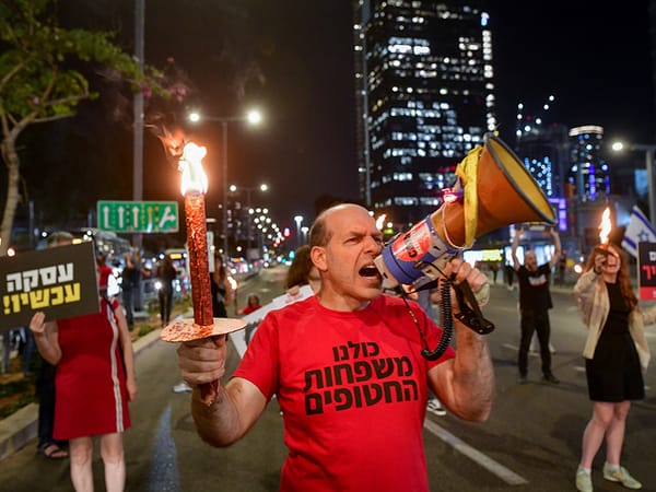 Protesters block Begin Highway near Azrieli towers in Tel Aviv