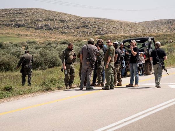 Israeli injured by explosion as he tries to remove Palestinian flag on side of road