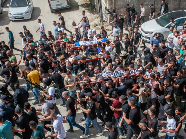 Jenin funeral: militants buried under Islamic Jihad flags